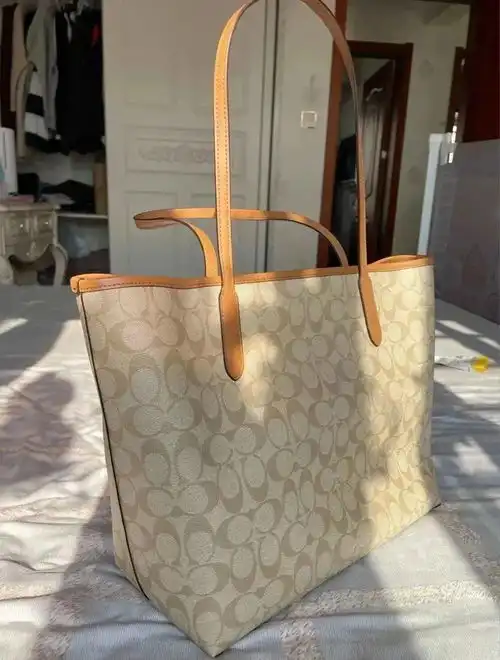 捡漏了蔻驰这款包包,900元都不到